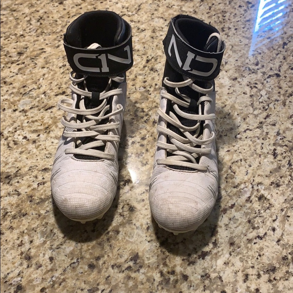 Boys size 5.5 Cam Newton football cleats